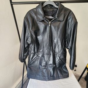Wilson Leather woman's jacket. Long length, cinch waste, quilted lining, size M